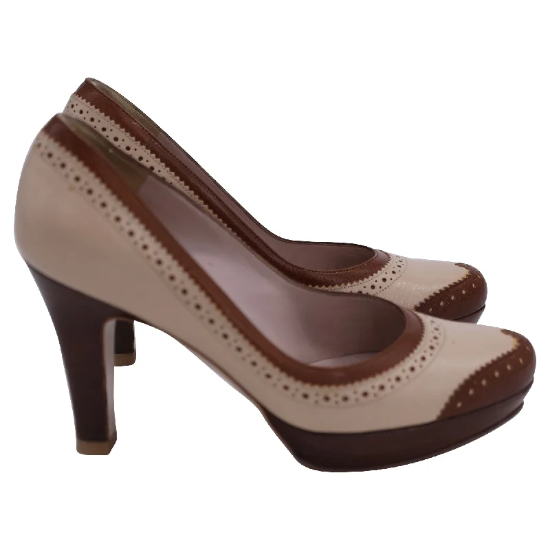 Salvatore Ferragamo Brogue Platform Pumps in Brown Leather